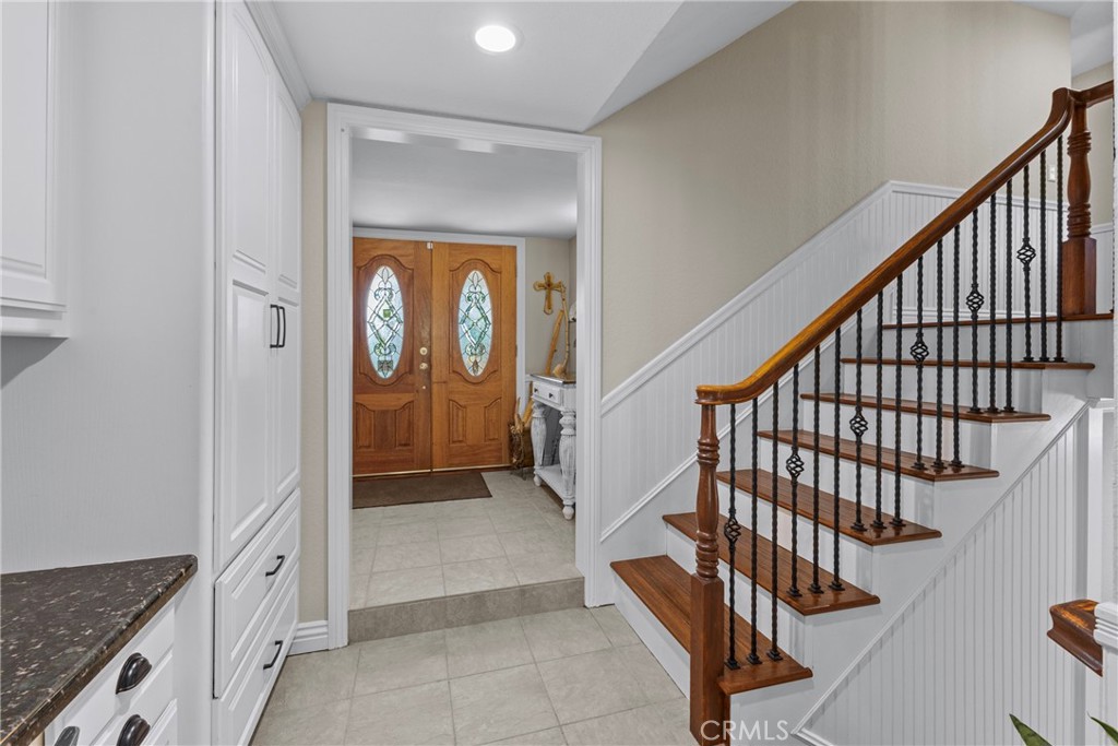 1446 Los Conejos Road Fallbrook, CA 92028 - Photo 8 of 66 a view of an entryway wooden floor and stairs