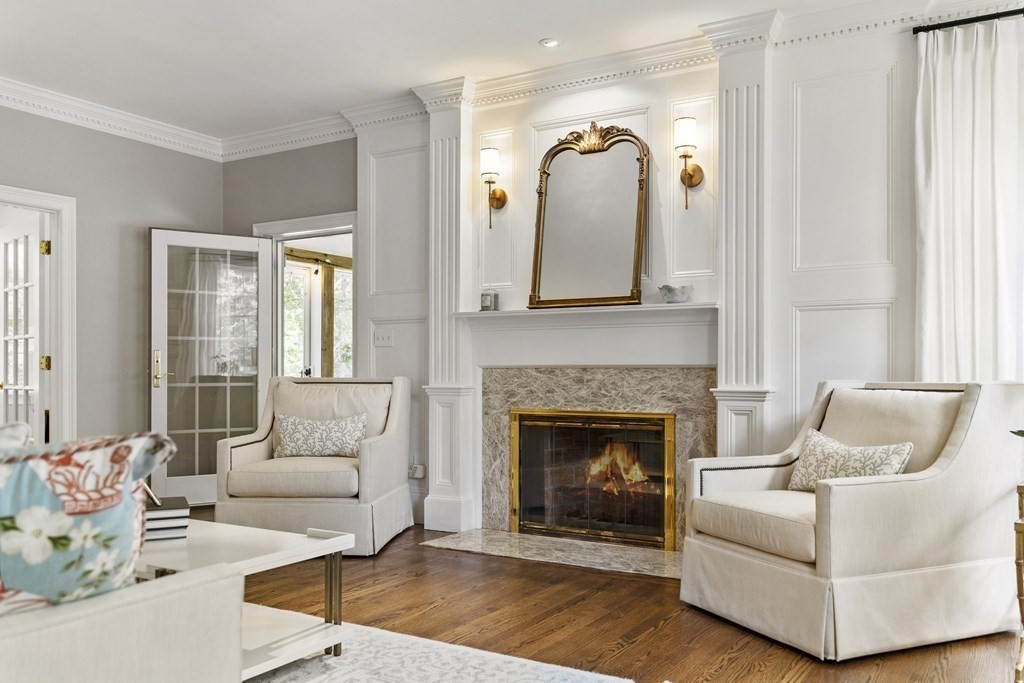 49 Pheasant Landing Road Needham, MA 02492 - Photo 6 of 42 a living room with furniture and a fireplace
