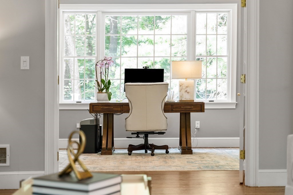 49 Pheasant Landing Road Needham, MA 02492 - Photo 8 of 42 a view of living room with a window and chandelier