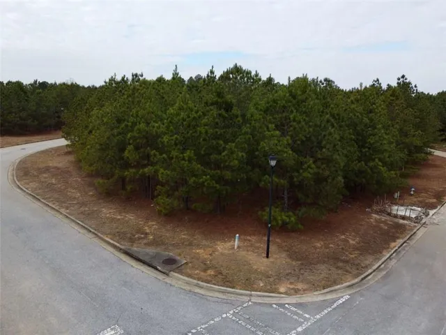 a view of a water fountain in front of a house