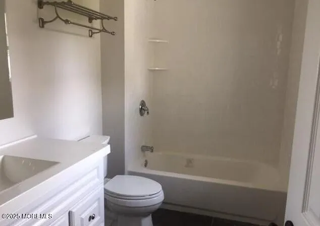 a bathroom with a sink a toilet and a bathtub