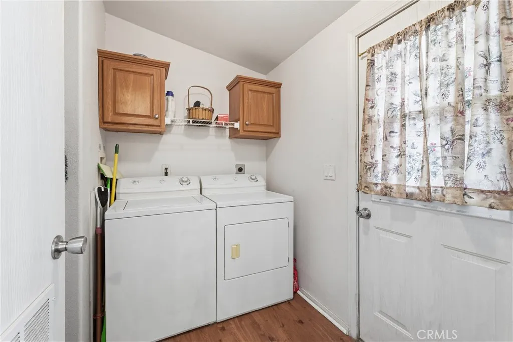 20843 Waalew Road, Unit C48 Apple Valley, CA 92307 - Photo 16 of 33 a utility room with dryer and washer
