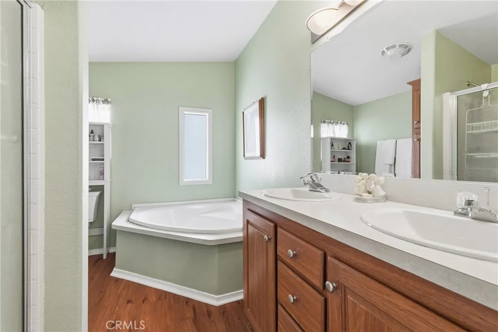 20843 Waalew Road, Unit C48 Apple Valley, CA 92307 - Photo 20 of 33 a bathroom with a sink and a mirror