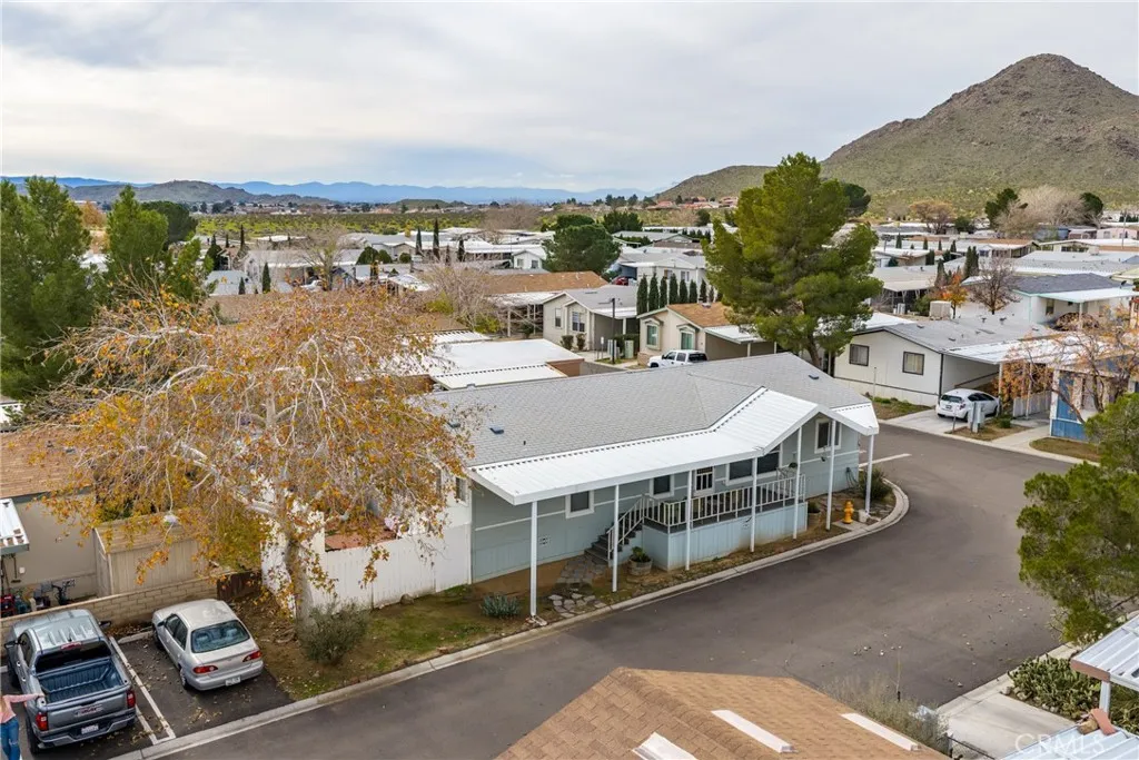 20843 Waalew Road, Unit C48 Apple Valley, CA 92307 - Photo 26 of 33 a view of a city with tall buildings