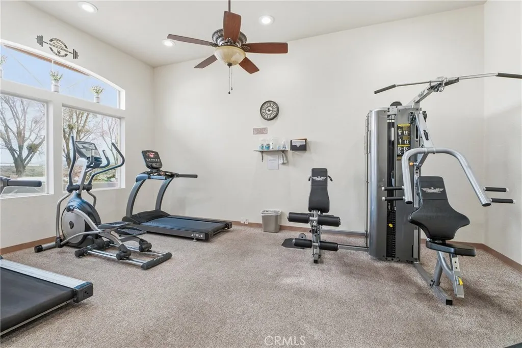 20843 Waalew Road, Unit C48 Apple Valley, CA 92307 - Photo 30 of 33 a view of a room with gym equipment