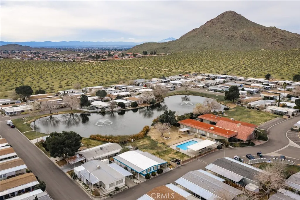 20843 Waalew Road, Unit C48 Apple Valley, CA 92307 - Photo 33 of 33 an aerial view of residential houses with outdoor space