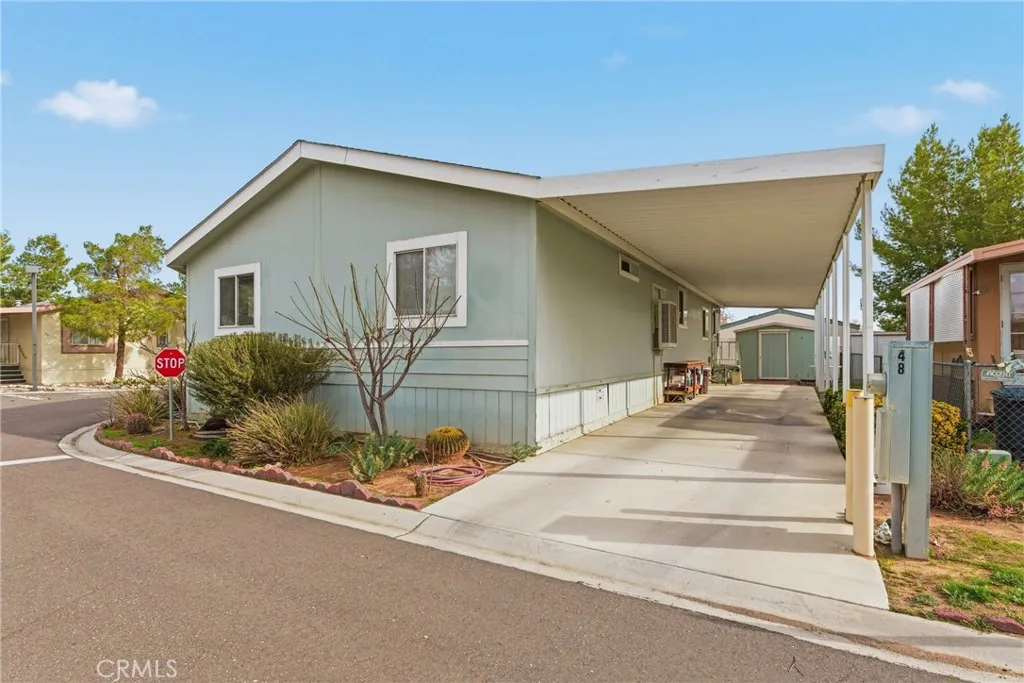 20843 Waalew Road, Unit C48 Apple Valley, CA 92307 - Photo 4 of 33 a house with a outdoor space