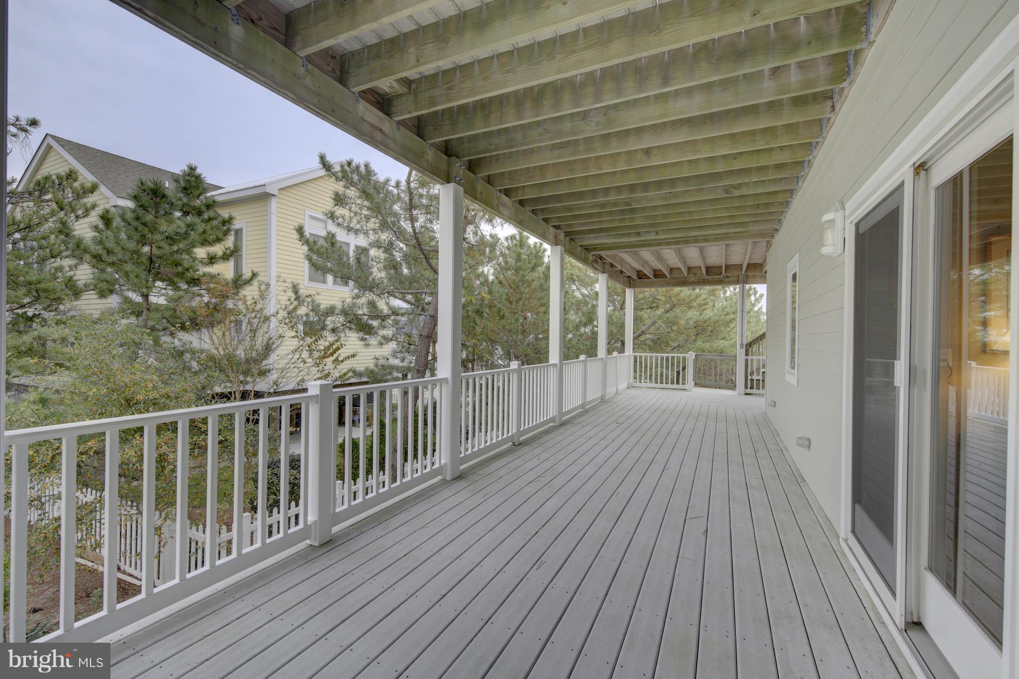 34 Short Road Bethany Beach, DE 19930 - Photo 14 of 54 Up Level 1 Spacious Covered Deck with Ocean Views