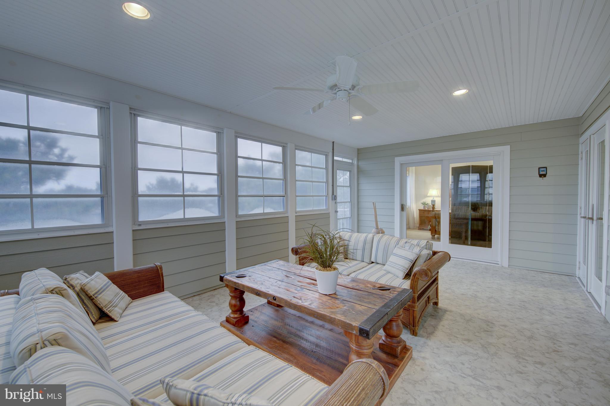 34 Short Road Bethany Beach, DE 19930 - Photo 25 of 54 Sunroom for many crabfeasts! 332 additional sq ft