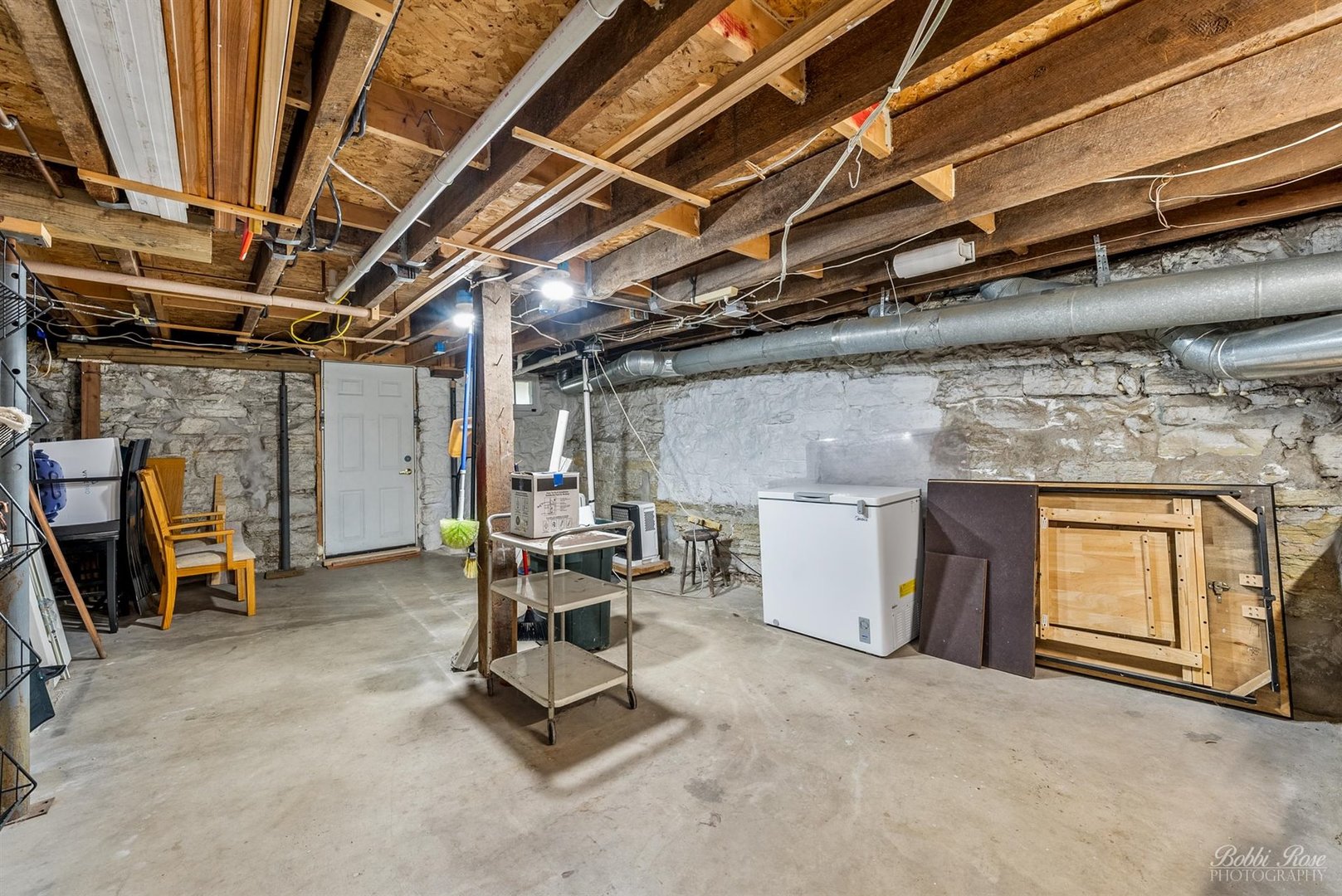22489 Glidden Road DeKalb, IL 60115 - Photo 28 of 44 a view of a storage room with utility room