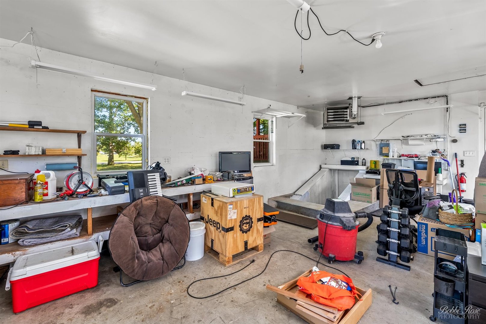 22489 Glidden Road DeKalb, IL 60115 - Photo 29 of 44 a view of a workspace with furniture and a window