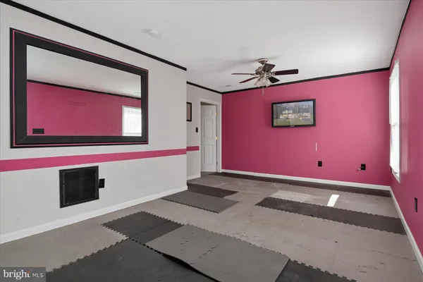 a bathroom with a granite countertop sink mirror and a bathtub