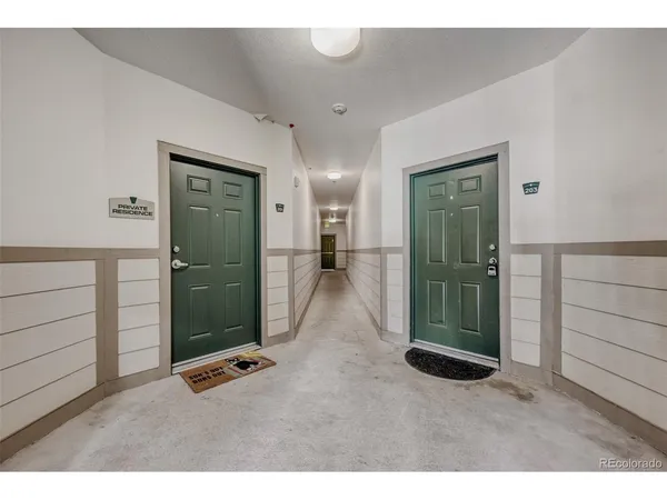 a view of a hallway with closet