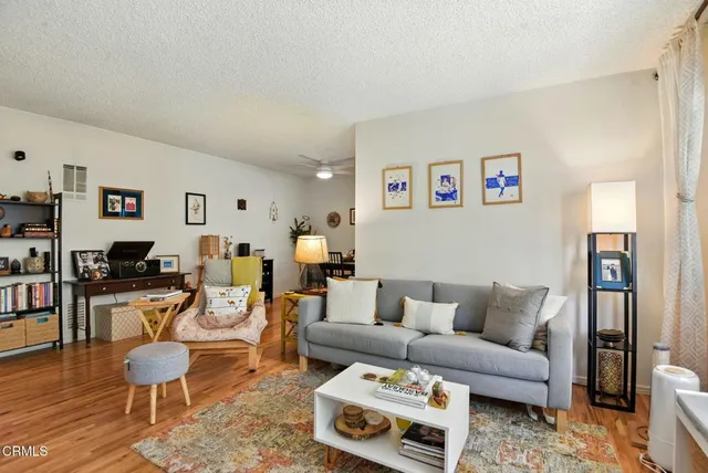 a kitchen with stainless steel appliances a sink and a refrigerator
