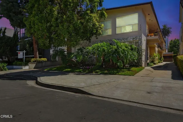 a view of a garden with a pathway