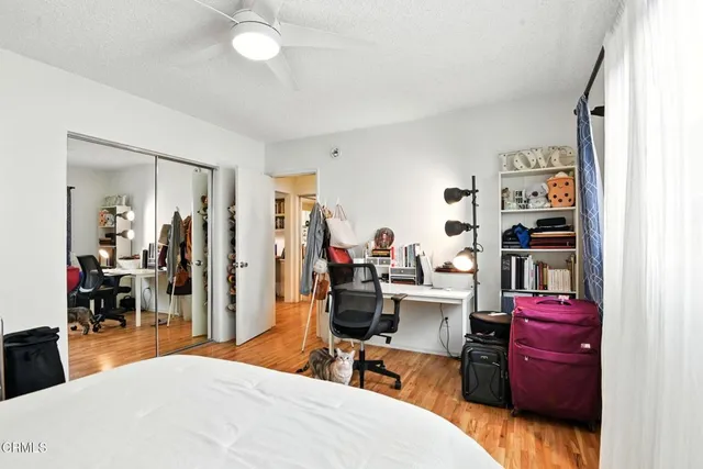 a room with a washing machine and sink