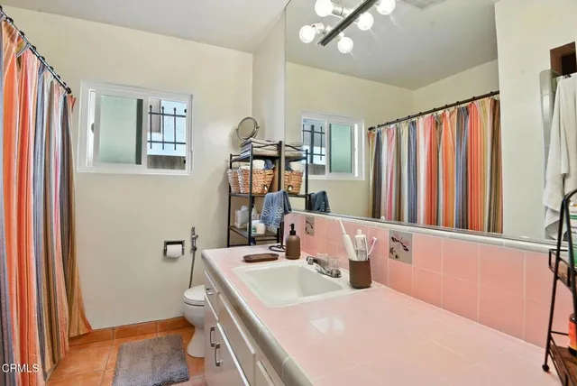 a bedroom with a bed and a cabinets