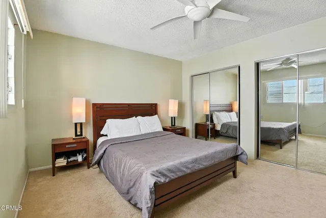 a room with furniture and flat screen tv