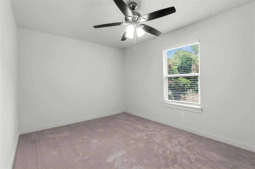 312 East Shepherd Street, Unit 312 Denison, TX 75021 - Photo 10 of 15 an empty room with a window