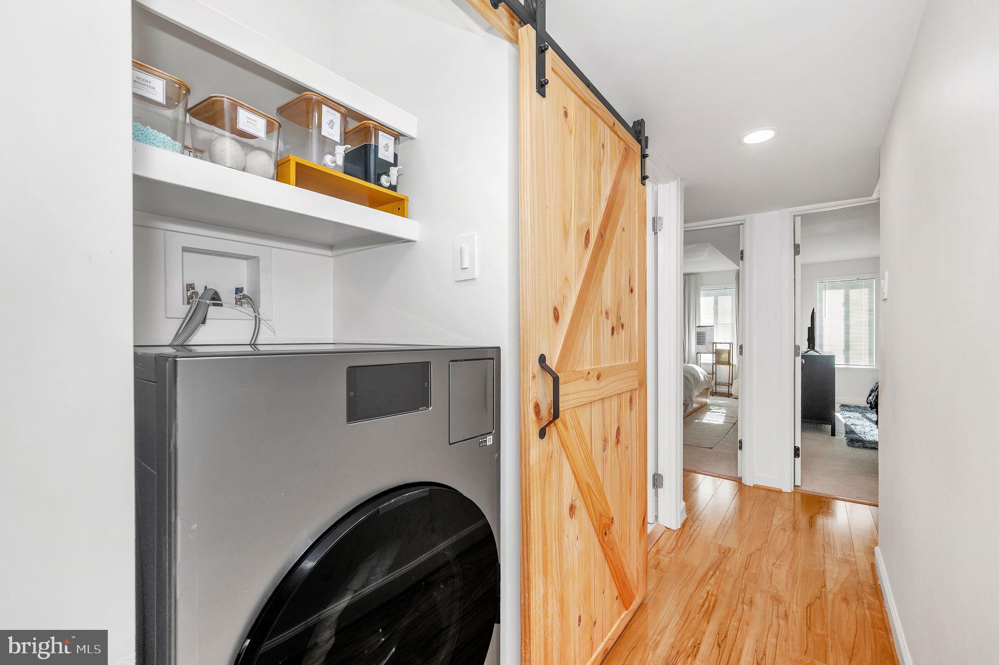 5025 7th Road South, Unit 202 Arlington, VA 22204 - Photo 15 of 39 a view of a hallway with wooden floor and furniture