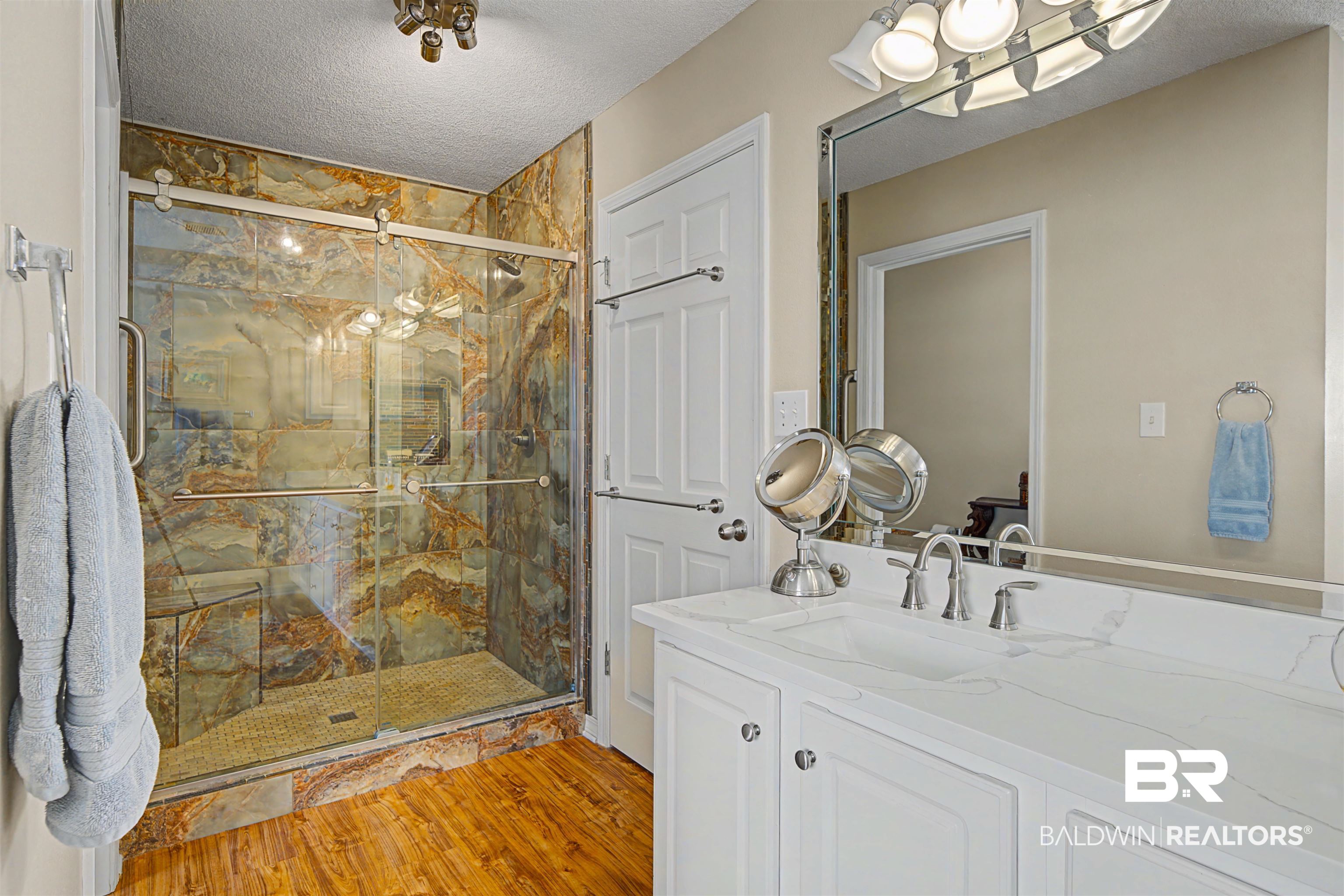 313 Collinwood Loop Foley, AL 36535 - Photo 21 of 36 Bathroom with beautiful updated shower.