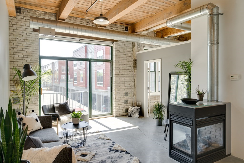 a living room with furniture and a window