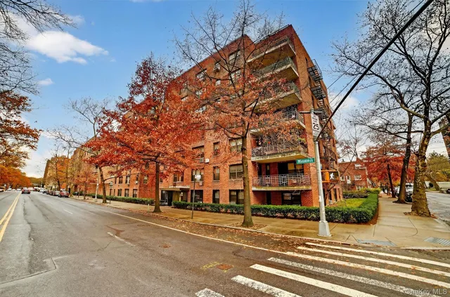 a view of a building with a street
