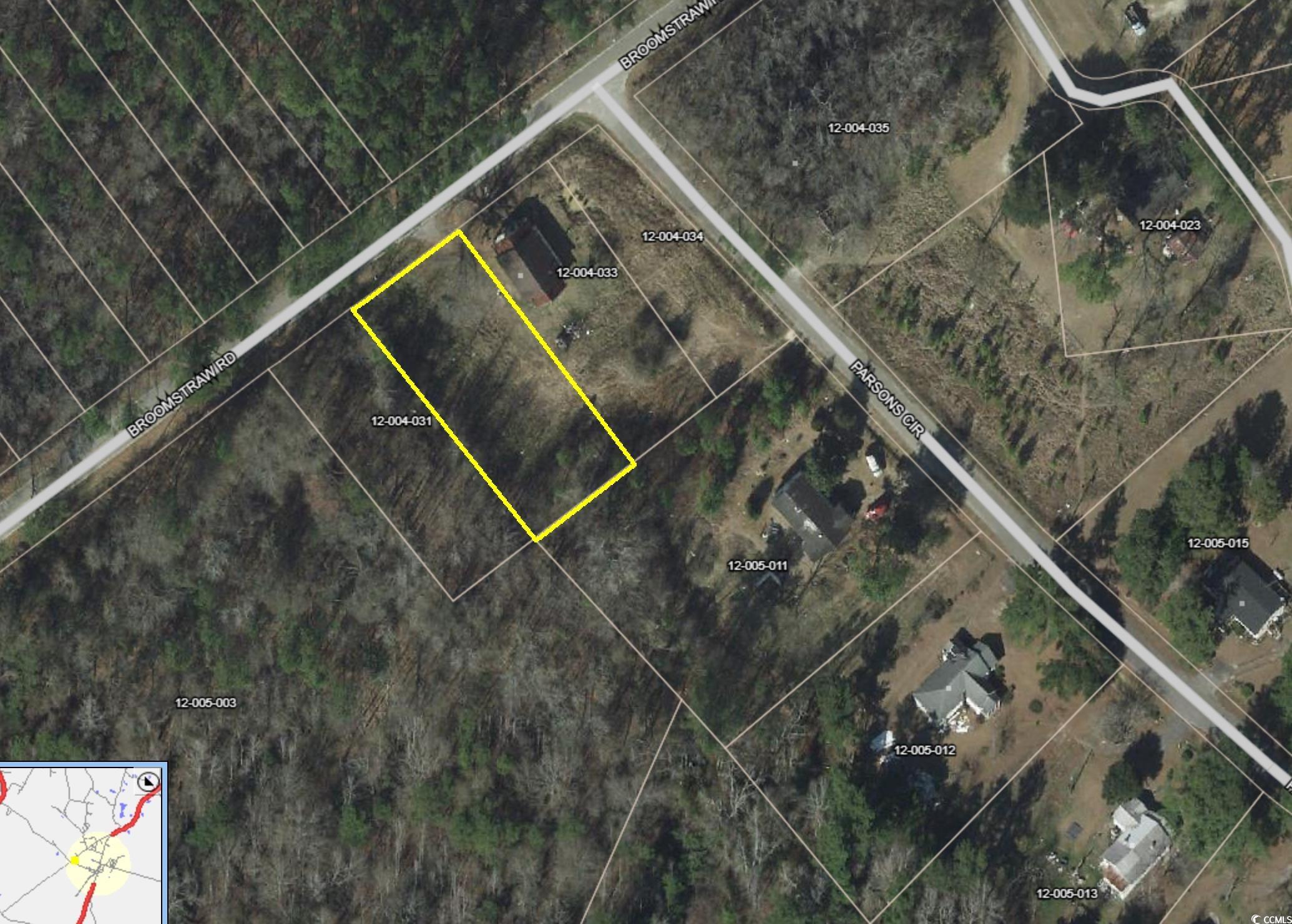 Aerial view of property's location featuring property parcel outlined
