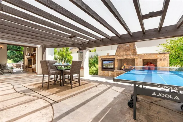 a kitchen with stainless steel appliances granite countertop a sink and cabinets