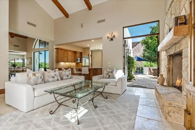 a kitchen with stainless steel appliances granite countertop a sink and cabinets