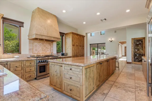a view of a livingroom with furniture and an entryway