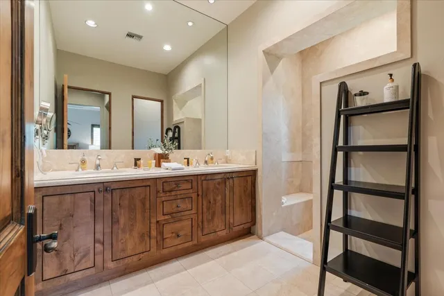 a backyard of a house with yard and outdoor seating