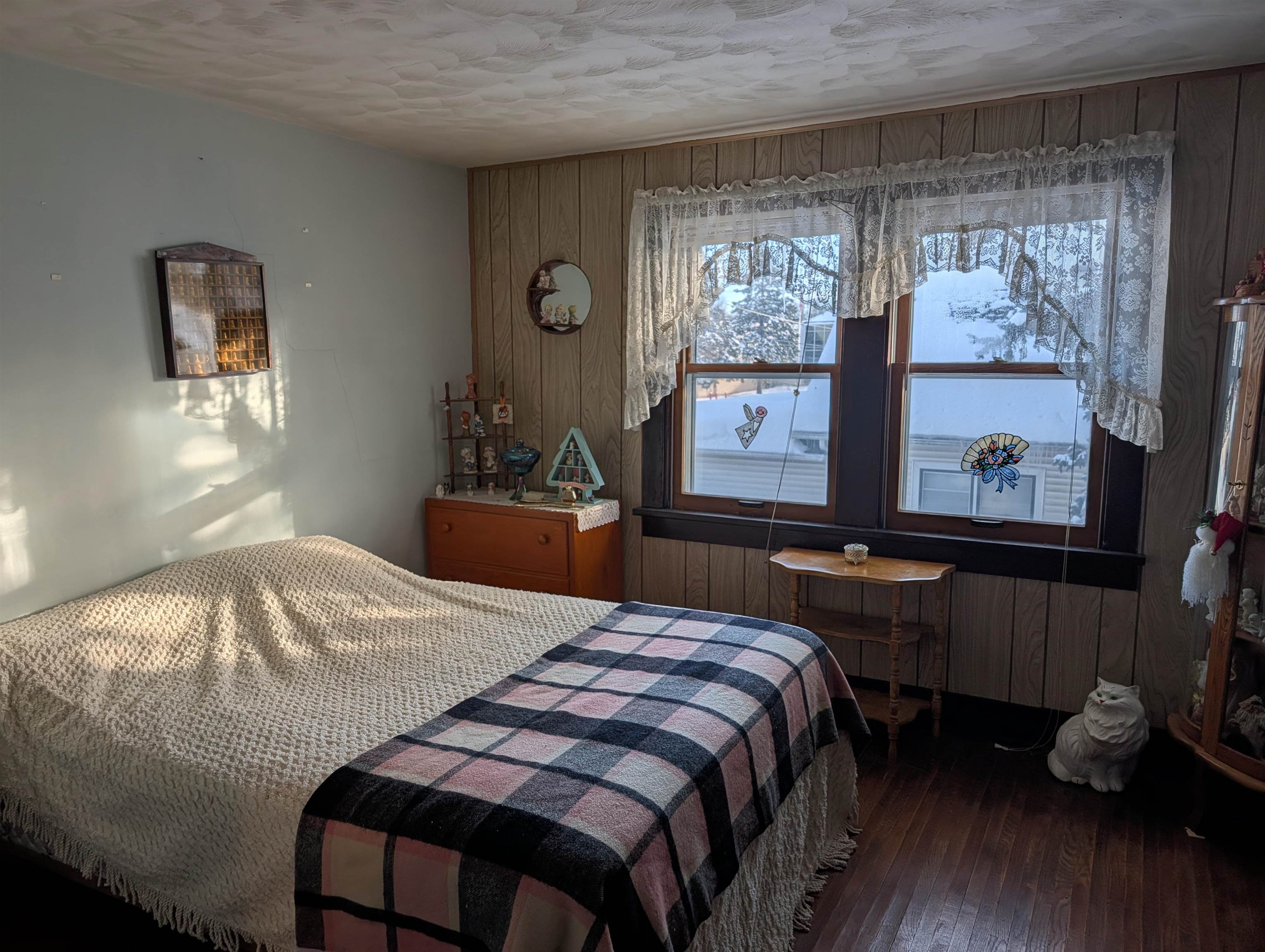 321 Eureka Street Genoa, IL 60135 - Photo 13 of 15 a bedroom with a bed and window