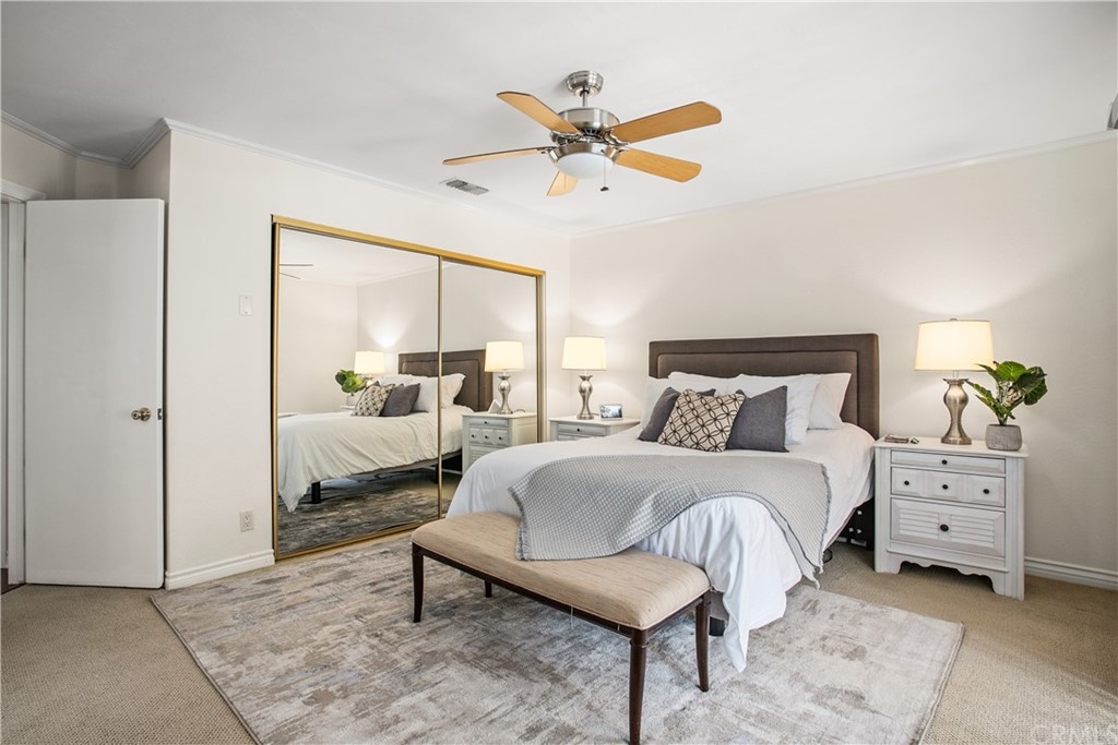 13019 Adah Lane Poway, CA 92064 - Photo 17 of 34 a bedroom with a bed and a window