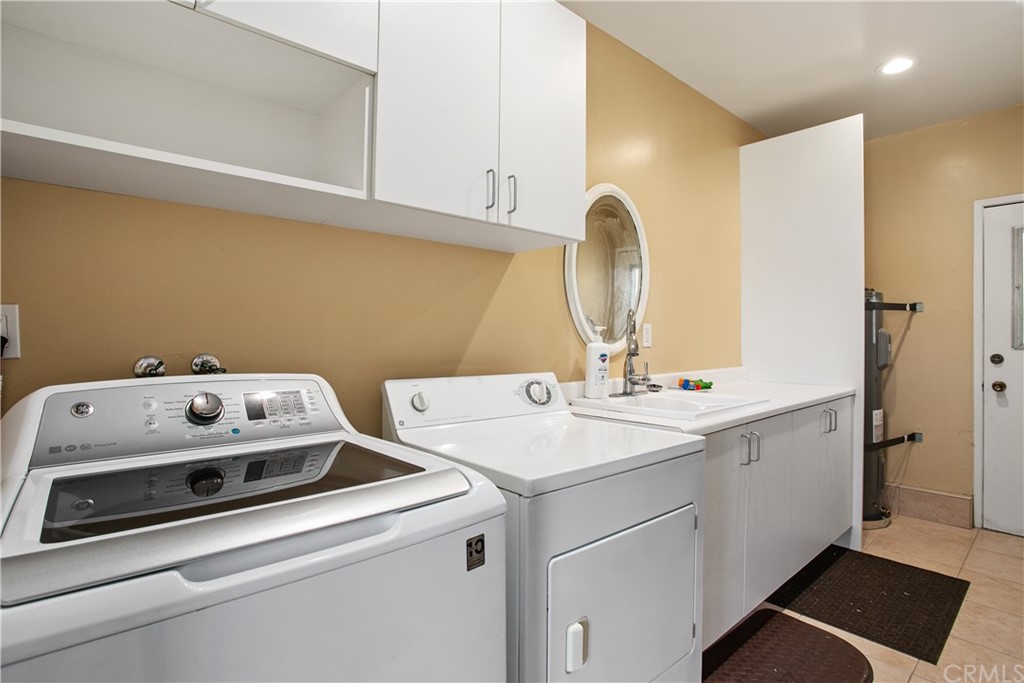 13019 Adah Lane Poway, CA 92064 - Photo 21 of 34 a utility room with dryer and washer
