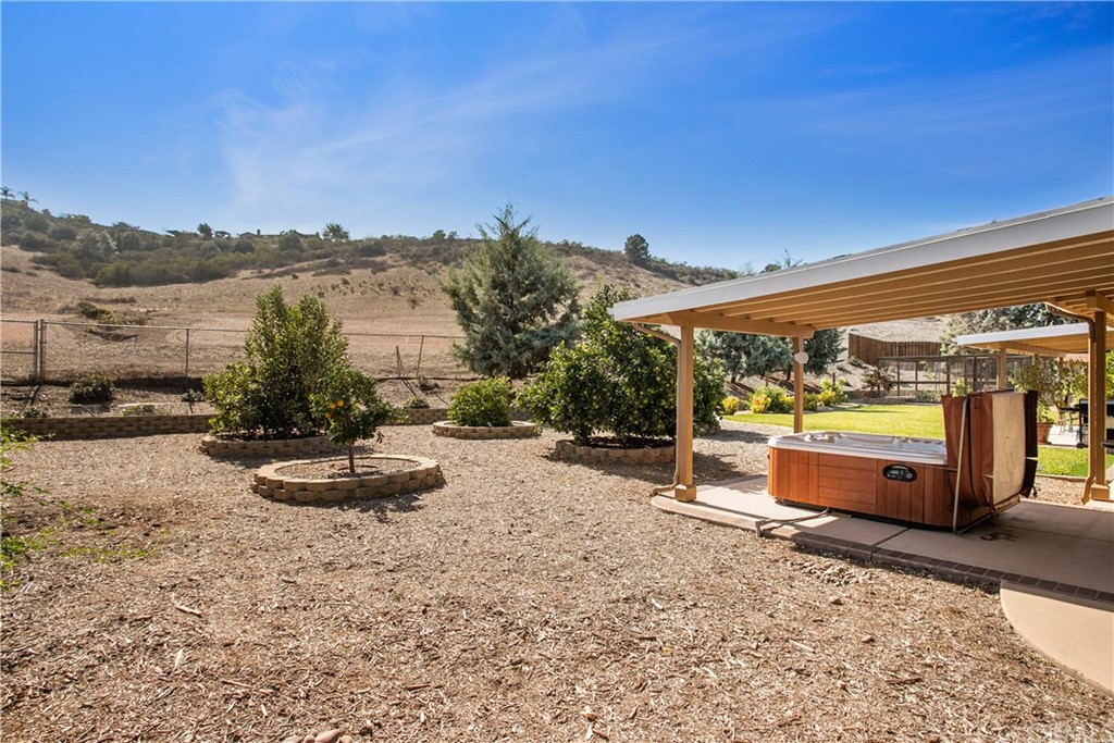 13019 Adah Lane Poway, CA 92064 - Photo 25 of 34 a view of a swimming pool with an outdoor seating and a ocean view