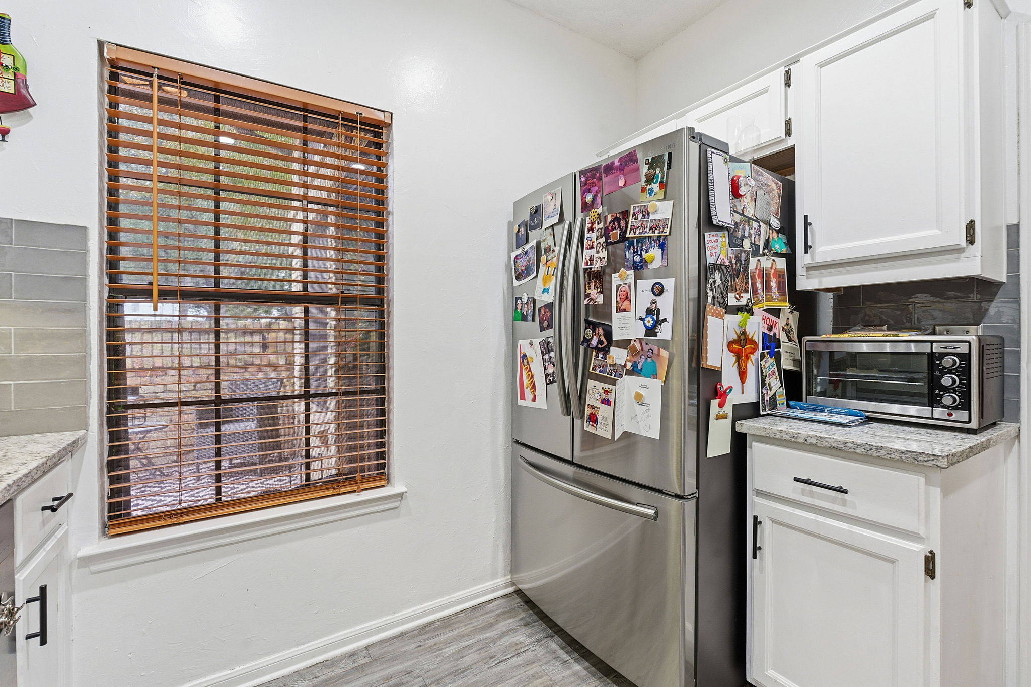 10819 Crown Colony Drive, Unit 33 Austin, TX 78747 - Photo 16 of 27 a view of a kitchen with fridge and rack