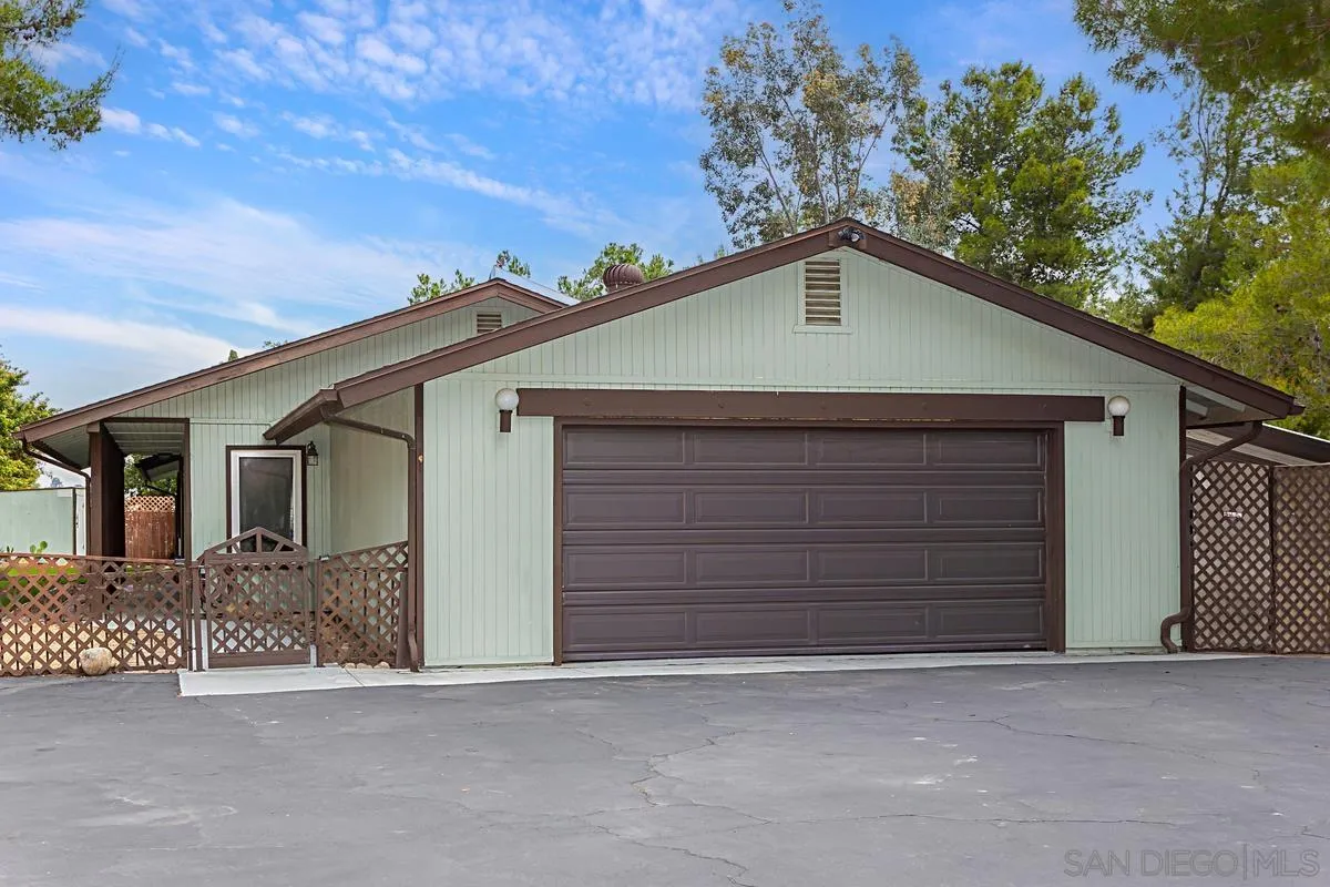 a front view of a house with a garage