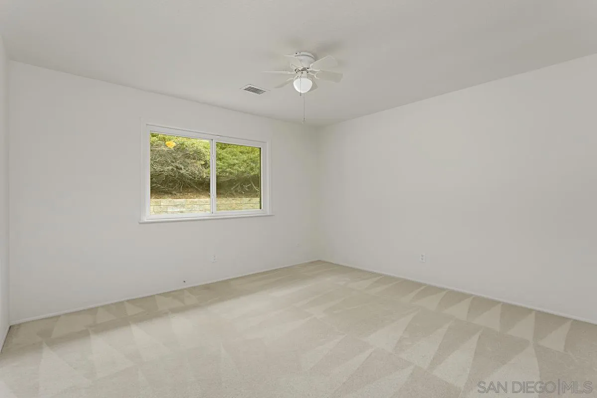 12759 Claire Drive Poway, CA 92064 - Photo 20 of 40 an empty room with a window