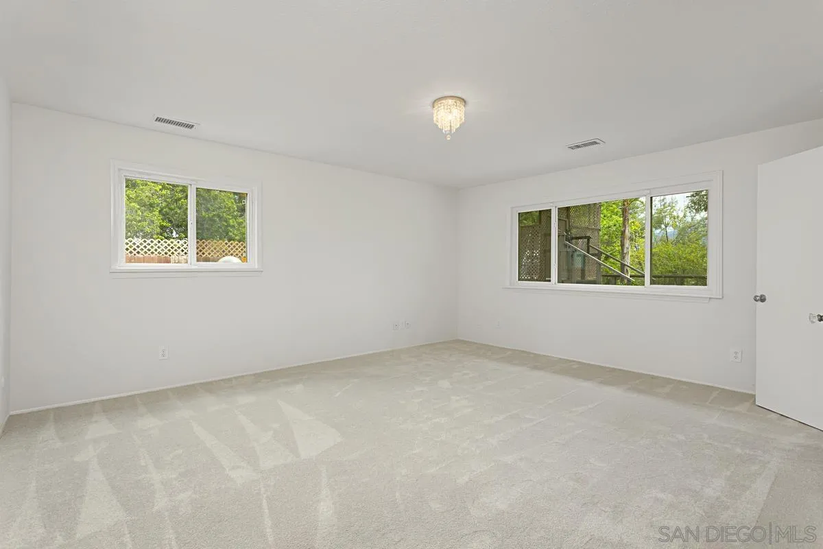 12759 Claire Drive Poway, CA 92064 - Photo 24 of 40 an empty room with windows