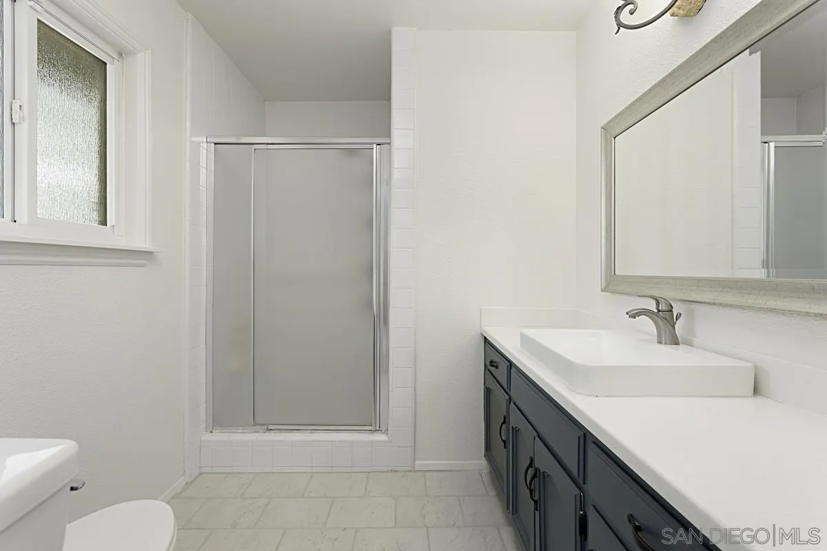 12759 Claire Drive Poway, CA 92064 - Photo 26 of 40 a bathroom with a sink a toilet and shower