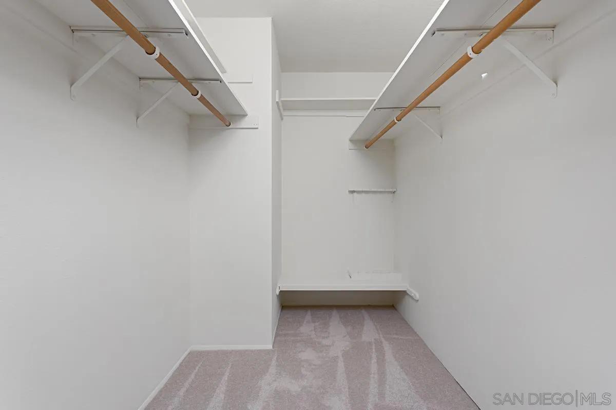 12759 Claire Drive Poway, CA 92064 - Photo 28 of 40 a view of an empty walk in closet