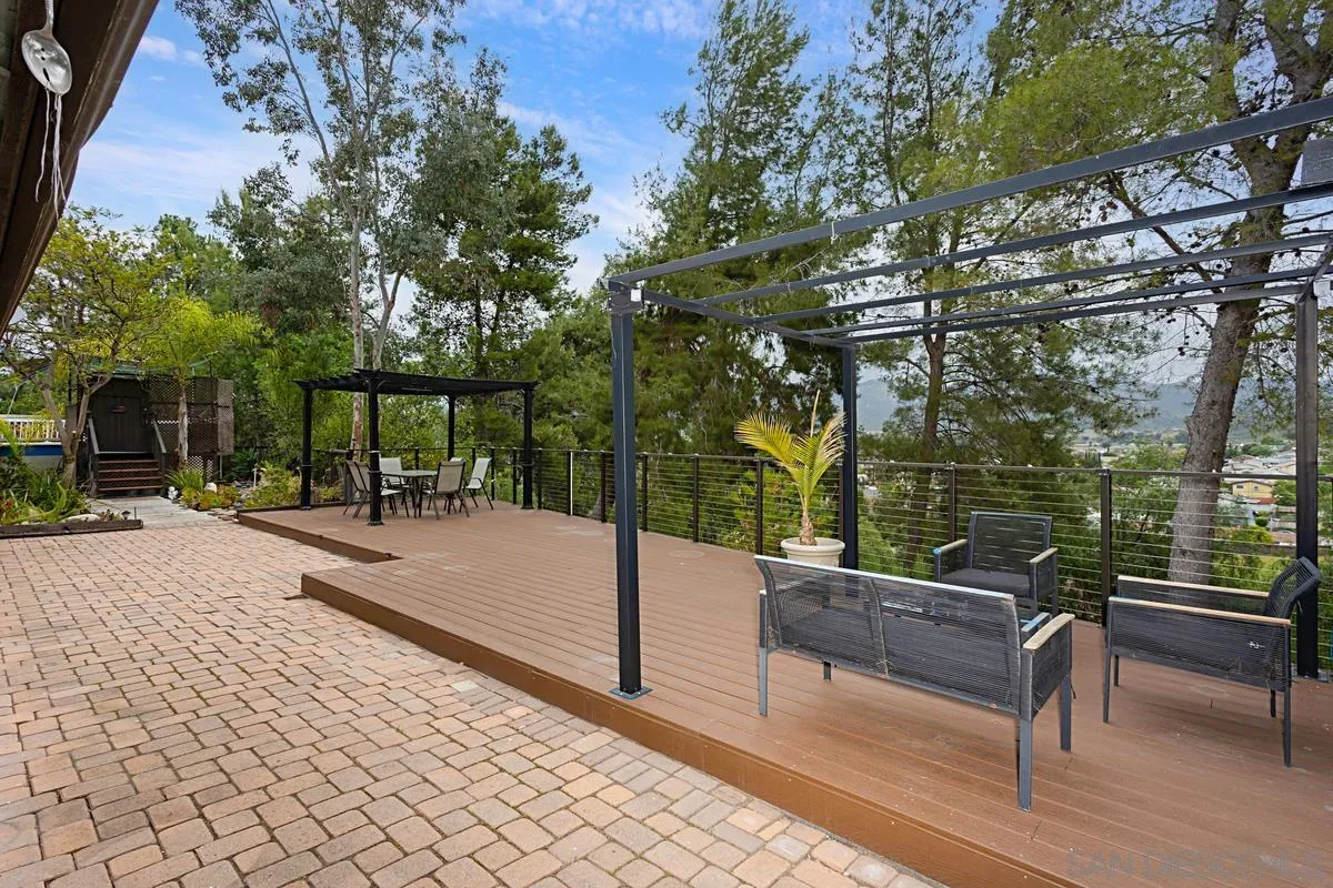12759 Claire Drive Poway, CA 92064 - Photo 32 of 40 a view of a patio with chairs and a table