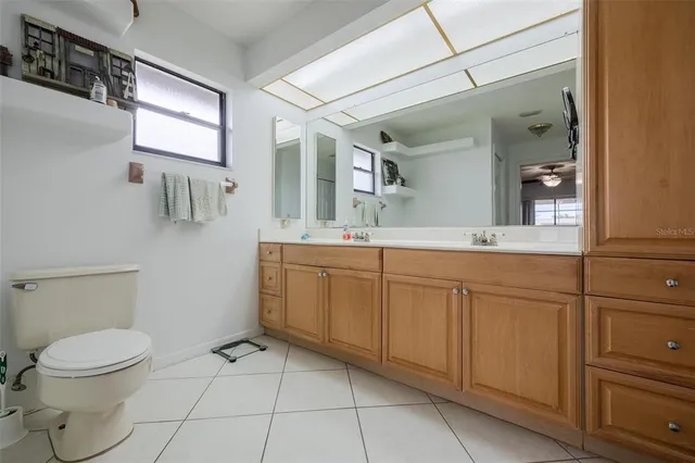 a bathroom with a shower and a sink