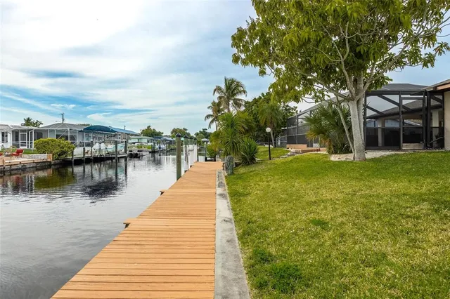 a view of a swimming pool with a patio