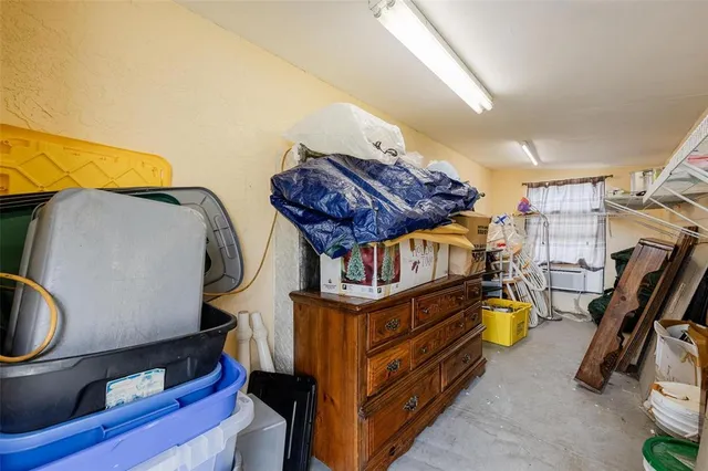 a bathroom with a shower and a sink