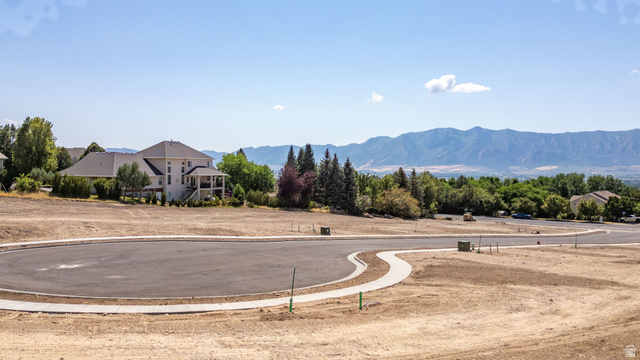 1473 Red Fox Court, Unit 4 Logan, UT 84321 - Photo 13 of 19 New construction land parcel featuring a paved cul-de-sac and concrete sidewalks