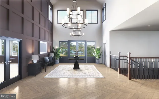 a living room with fireplace furniture and a large window