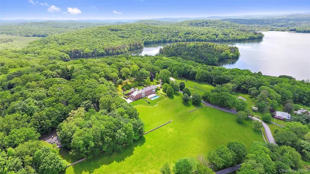 a view of lake with green space
