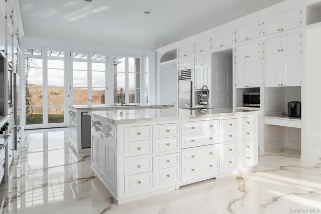 a bathroom with a double vanity sink mirror and double